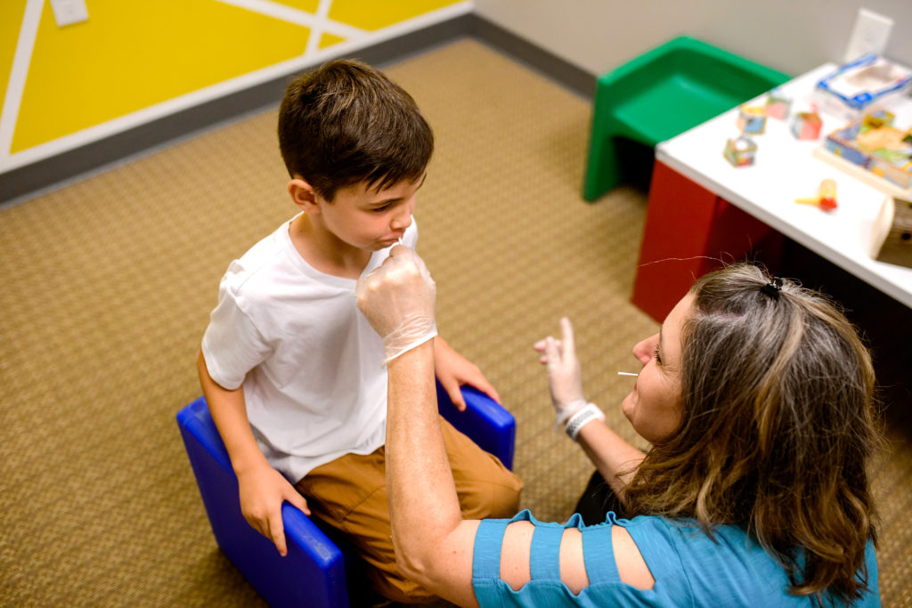 Basal therapist working with child