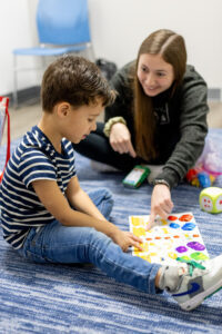 Child participating in speech therapy activities